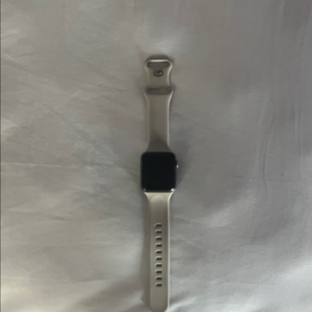 Apple Watch with Cream colored band